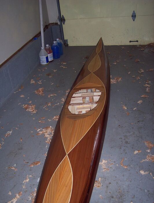 A layer of epoxy before the fiberglass