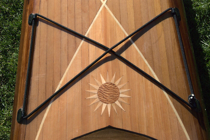 The sun is farmed lacewood and curly maple